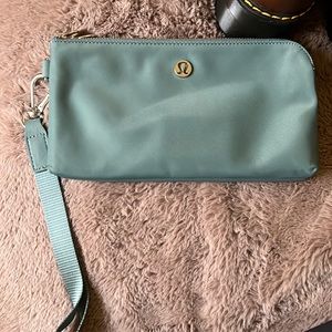 Lululemon wristlet. Teal. Never used
